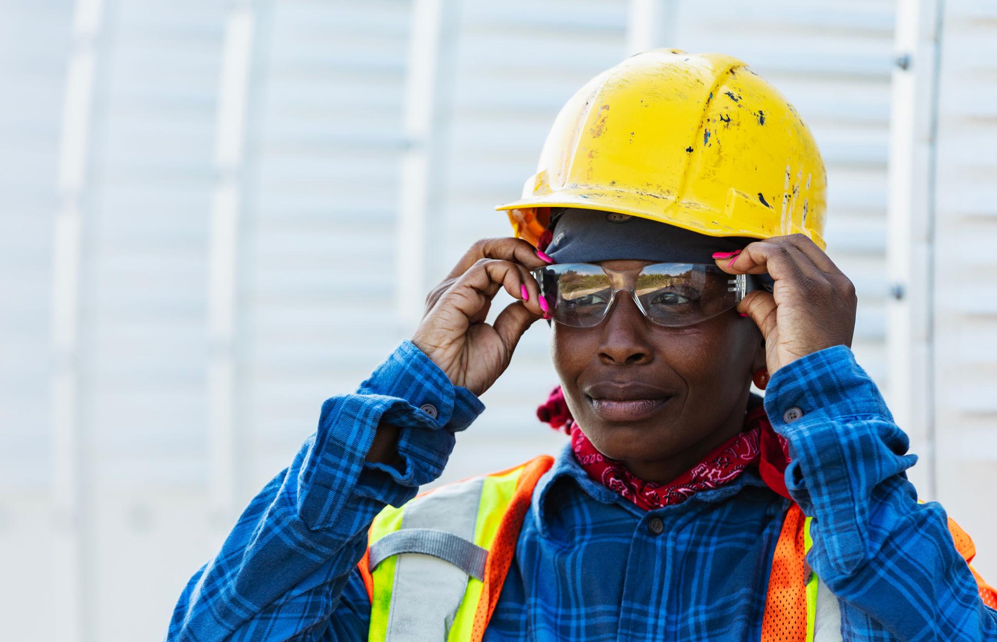 Hollyspower Construction team member reviewing project plans